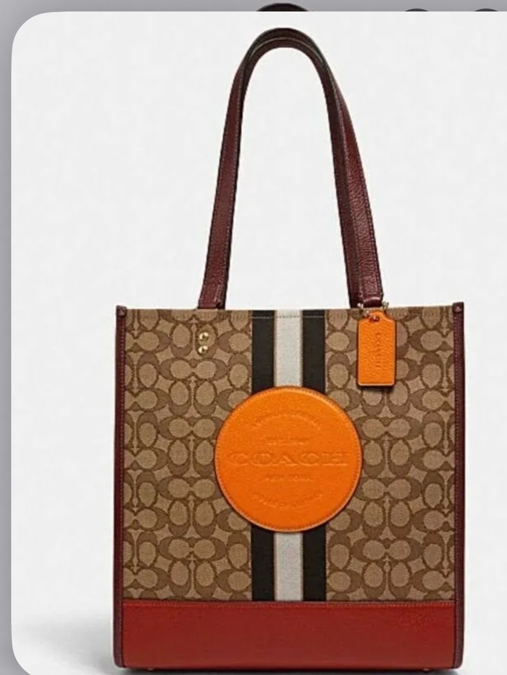 Coach Dempsey Brown Signature Tote with Orange Accent and Burgundy Trim